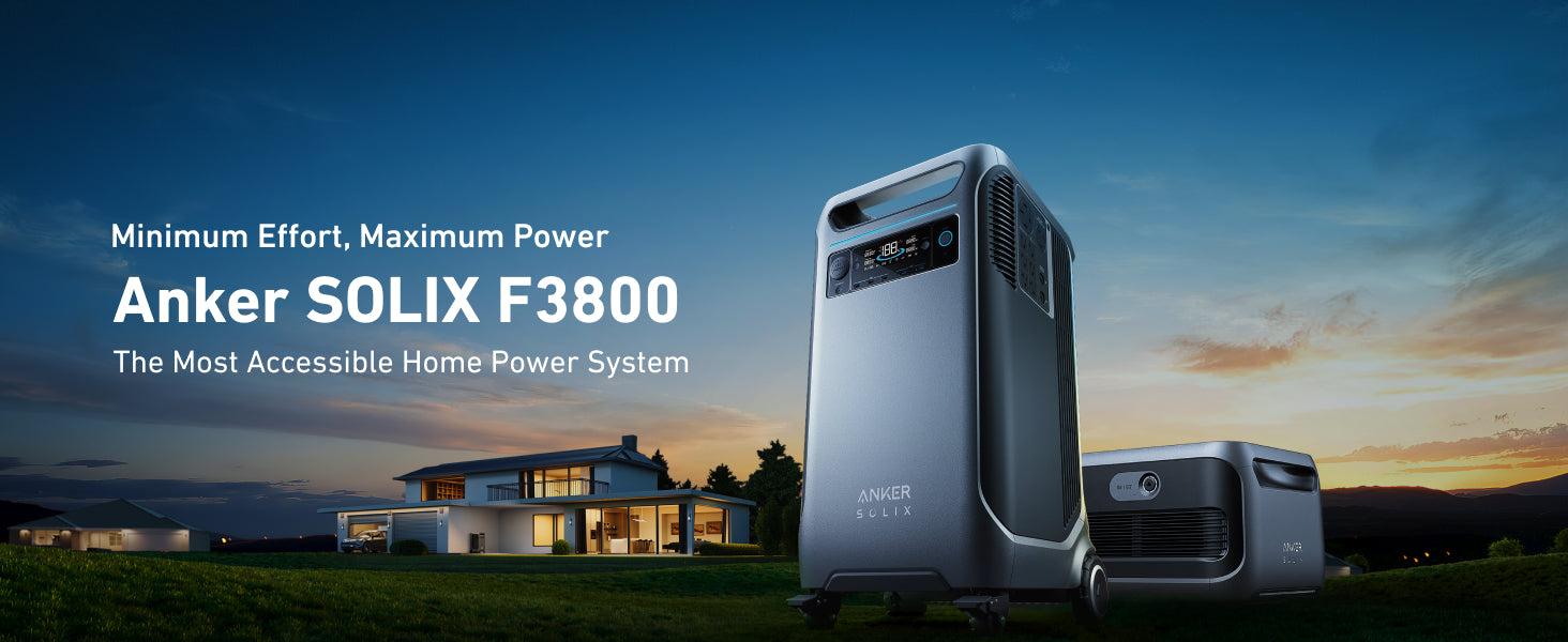 Two Anker SOLIX BP3800 Expansion Batteries (3840Wh, LFP) sit on the grass at dusk before a modern house. The blue-orange sky highlights their power. Text: “Minimum Effort, Maximum Power. The Most Accessible Home Power System.”.