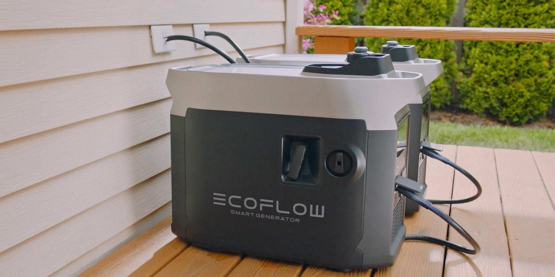 EcoFlow DELTA Pro 3600W 3.6kWh Portable Power Station + 400 Watts of Portable Solar Panels Two EcoFlow DELTA Pro 3600W 3.6kWh Portable Power Stations with 800W of 4 rigid solar panels are on a wooden deck near a house, plugged into outlets, with greenery and a fence in the background.