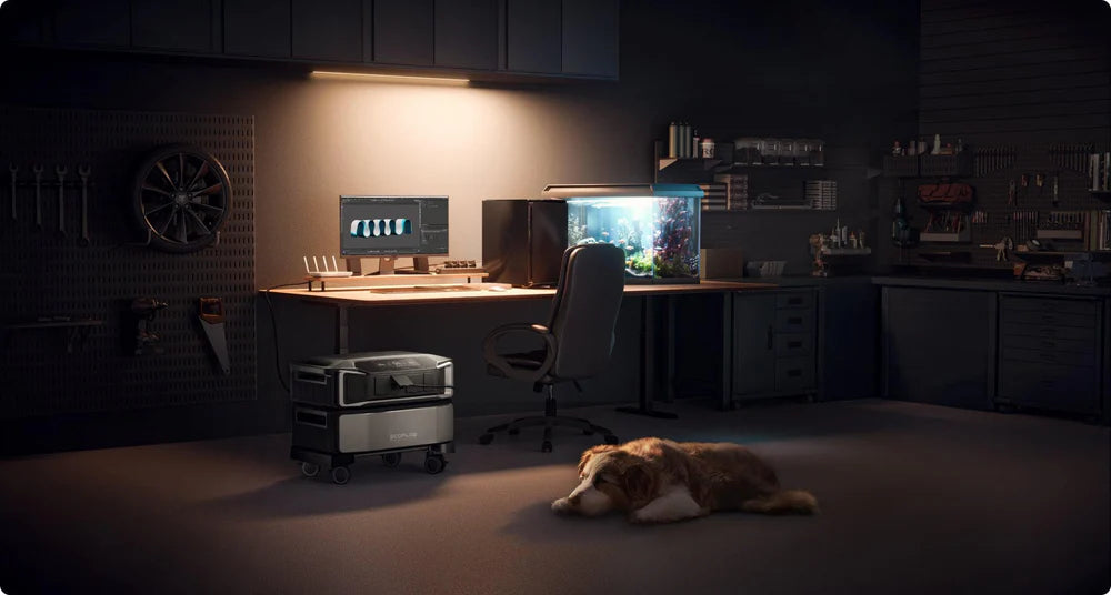 EcoFlow Delta Pro Ultra 7.2kW Portable Power Station A home office features a desk, chair, computer, and aquarium aglow. Tools hang on the wall, while an Ecoflow Delta Pro Ultra 7.2kW Portable Power Station sits nearby. A brown and white dog rests on the floor, adding coziness to the space.