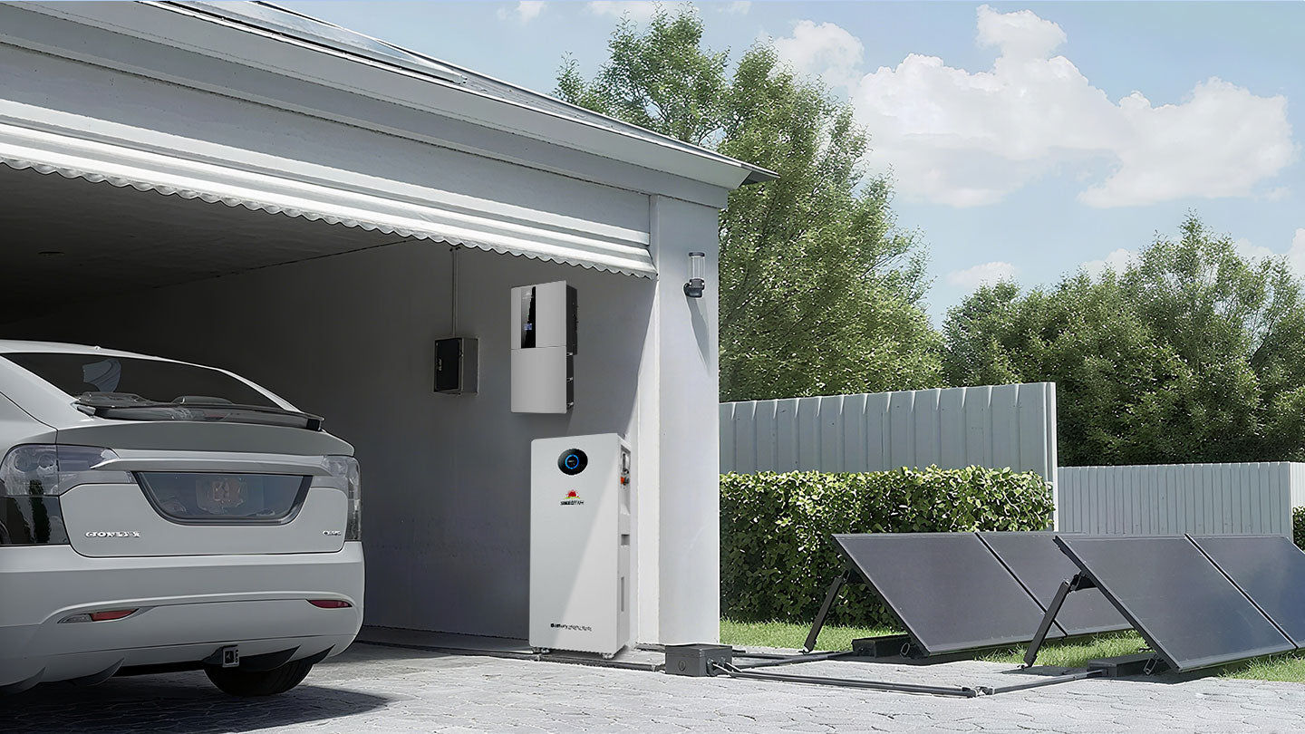 PowerMax 314 outdoor battery installed beside a garage with solar panels